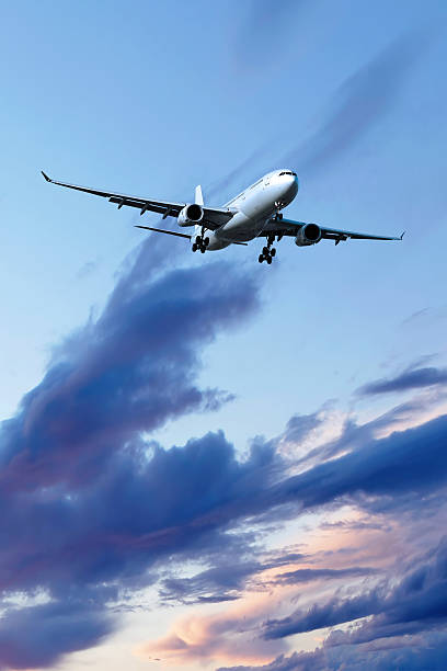 istock XXL jet airplane landing at dusk 136905692