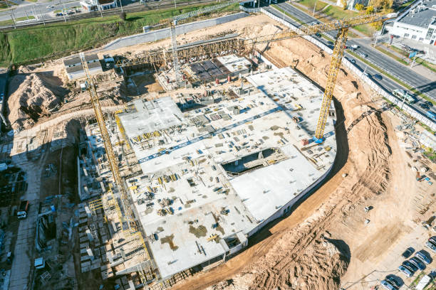 istock large construction site with working construction cranes. aerial view. 1369058223