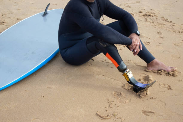 istock Close-up of man resting after training on beach 1369061196