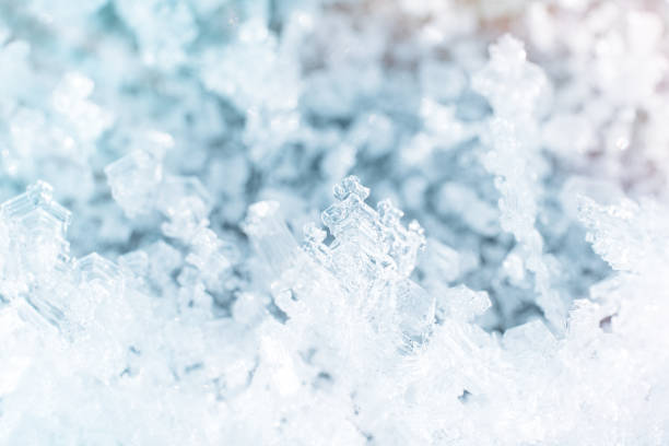 istock Crystal structure of ice against blurred background 1369063863