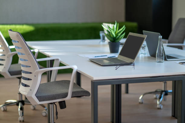 istock Office premises with a table for negotiations in the middle 1369064188