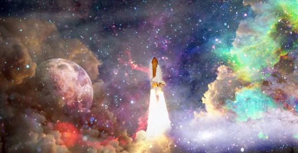 istock Rockets launch into space on the starry sky. Rocket starts into space concept.Elements of this image furnished by NASA 1369066194