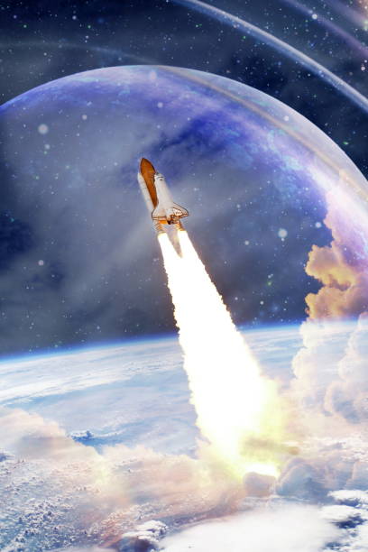 istock Rockets launch into space on the starry sky. Rocket starts into space concept.Elements of this image furnished by NASA 1369066232