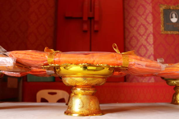 istock A monk's robes set on golden tray. 1369066385