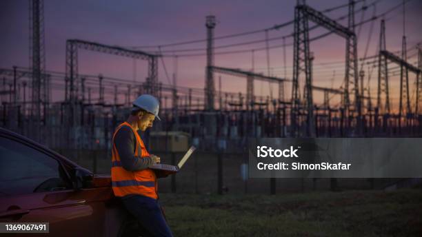 Quality Control On Power Station At Dusk Stock Photo - Download Image Now - Electricity, Power Line, Fuel and Power Generation