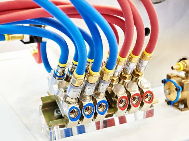 istock Hydraulic equipment with hoses 1369070885
