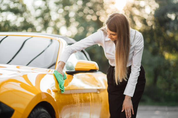 istock Car wash and cleaning at outdoors self service station 1369074388