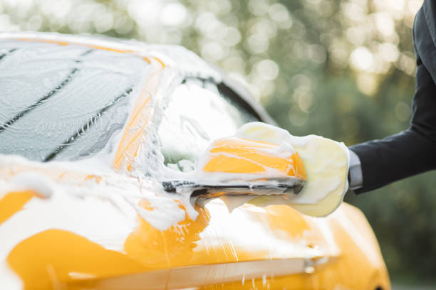 istock Luxury car covered by foam. 1369075269