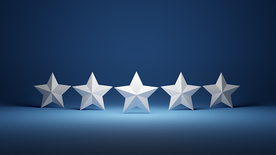 Five stars aligned in a row on the stage with blue background Five star rating show concept 3D render.
