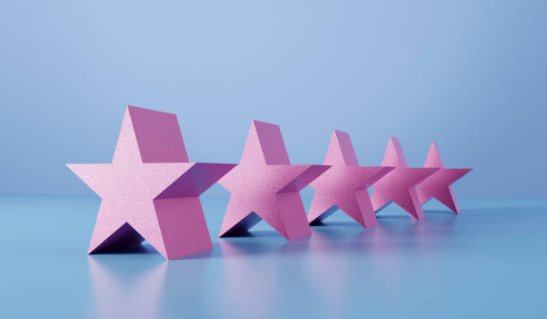 istock Pink five stars in a row on blue background. Five star rating customer or client satisfaction concept 1369075605