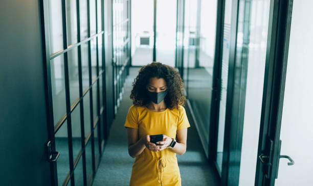 istock Businesswoman at work during COVID-19 pandemic 1369076549