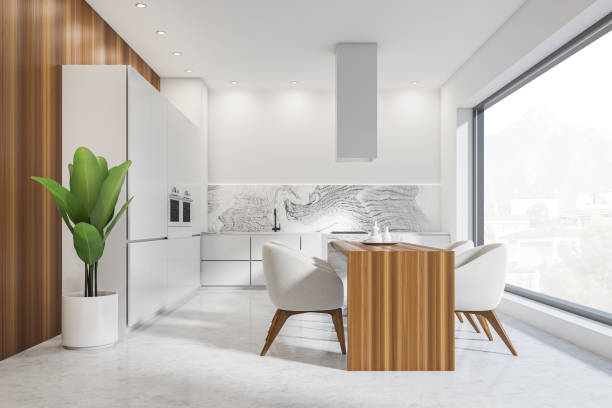 istock Bright kitchen room interior with panoramic window with town view 1369079188