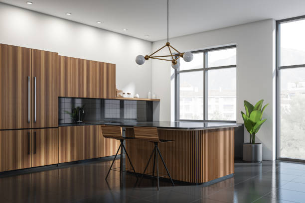 istock White and wooden kitchen set interior with dining table and bar chairs, window 1369079691