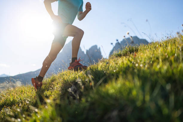 istock Young man trail running on the Dolomites mountain 1369082329