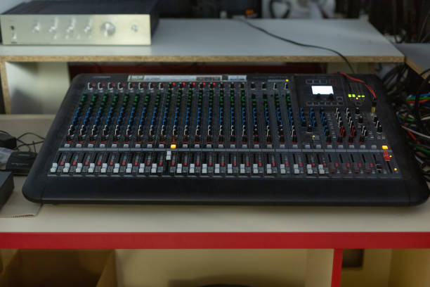 istock Television director's office with remote control and microphone, monitors, sensors, copy space 1369083783