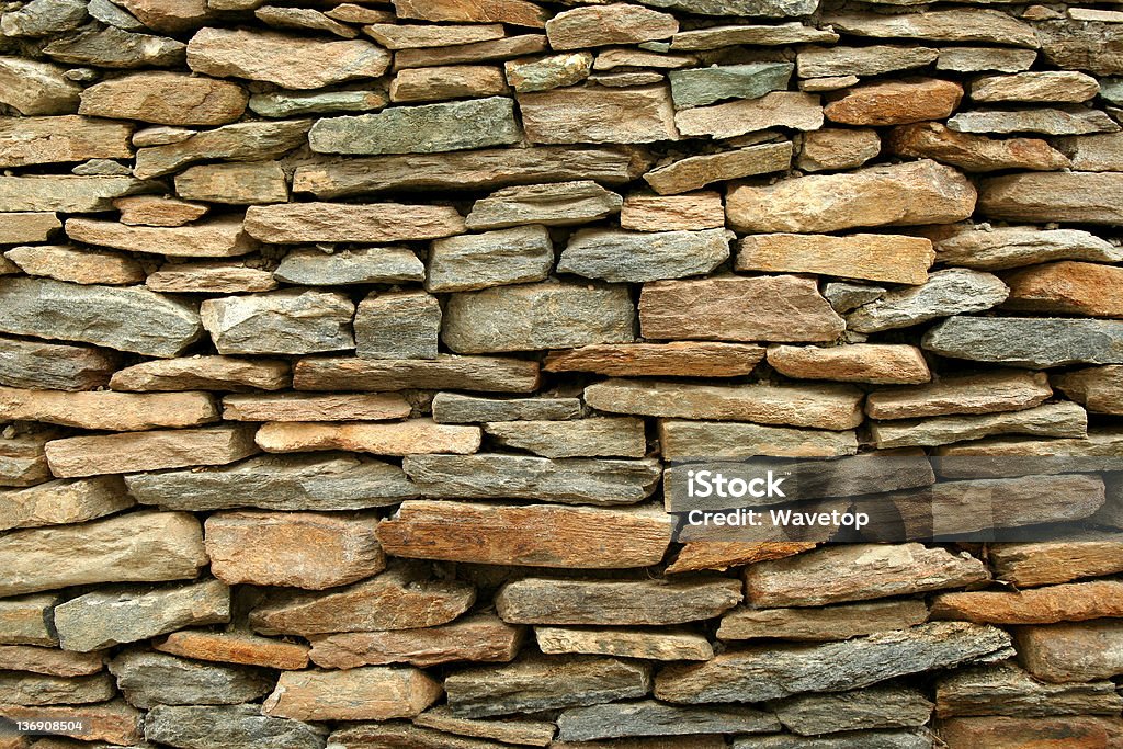 Pared de piedra - Foto de stock de Adoquinado libre de derechos