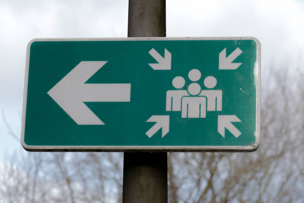 istock Direction Sign Assembly Point At Amsterdam The Netherlands 1369087167