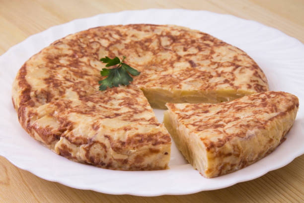 istock dish of typical Spanish potato omelette 1369087365