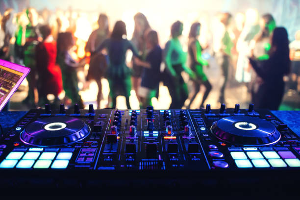 music controller dj mixer in a night club - dancing floor imagens e fotografias de stock