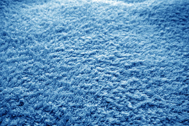 istock Bath towel texture with blur effect in navy blue tone. 1369088756