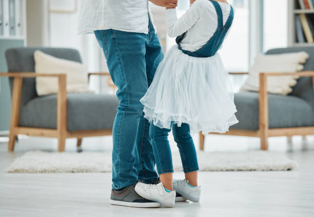 istock Shot of a father dancing with his daughter 1369088781
