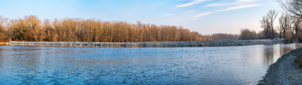Ticino river banks, wide winter panorama. Color image stock photo