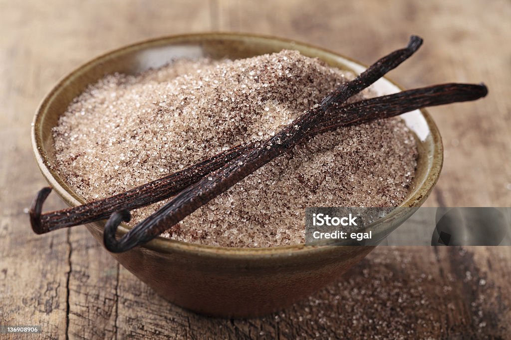 Bourbon vanilla sugar and beans Bourbon vanilla sugar and beans in bowl Vanilla Stock Photo