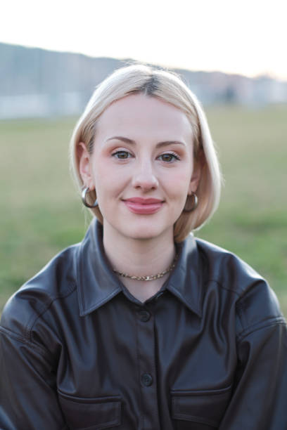 istock Young woman outdoors portrait. 1369089823