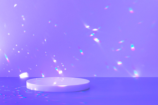 Abstract minimal scene - empty stage, circle podium on purple background with rainbow crystal light refraction sparkles. Pedestal for cosmetic product and packaging mockups display presentation