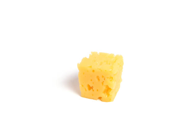 istock Piece of leaky, fresh cheese on a white background. 1369093979