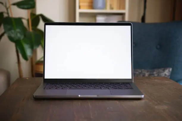 Blank screen modern laptop on table