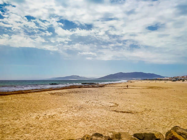 istock View of the ocean and sandy beach in Spain 1369097043