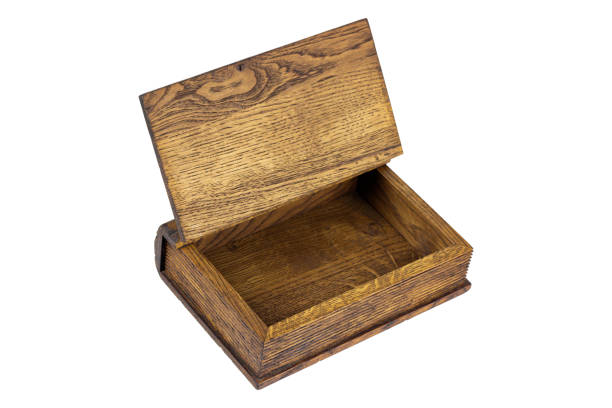 istock wooden old casket opened on white background 1369097480