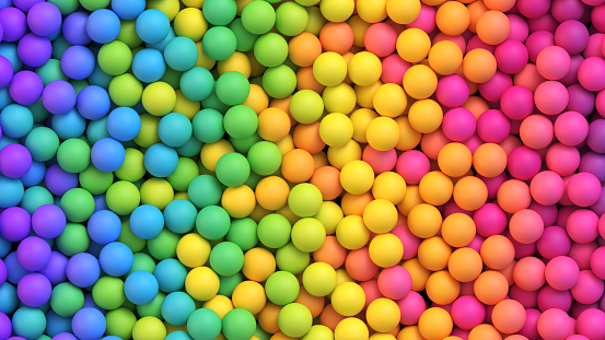 Colorful balls background for kids zone or children's playroom. Rainbow gradient bright soft balls background. Vector background