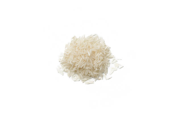 istock Heap of long grain rice on white background, top view. 1369098871