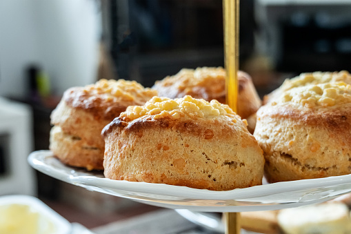 A close-up of cheese scones, traditional British food for afternoon tea