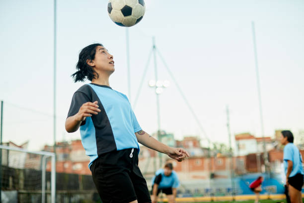 istock A skilled female soccer player is controlling the ball. 1369101430