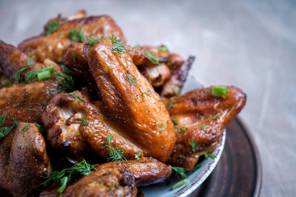 istock Plate of barbecue chicken wings. Top view. 1369101467