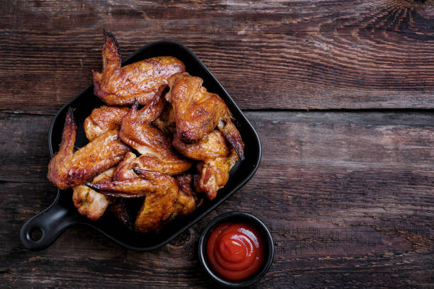 istock Plate of barbecue chicken wings. Top view. 1369101534