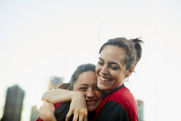 istock Two soccer players celebrate a goal. 1369101551