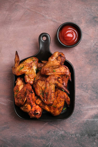 istock Plate of barbecue chicken wings. Top view. 1369101573