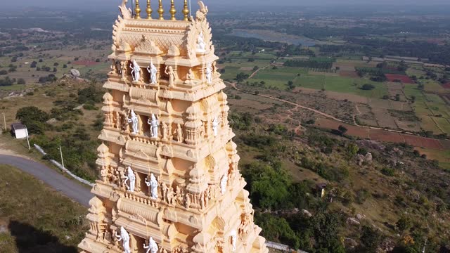 Cinematic Aerial view of south Indian temple 4k. Drone flying above thetemple
