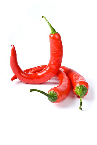 istock Hot Red Chili Peppers Isolated on White 136910413