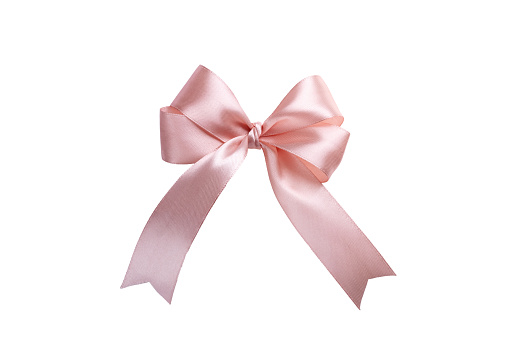 Pink bow isolated on white background. Satin ribbon product for gift decoration