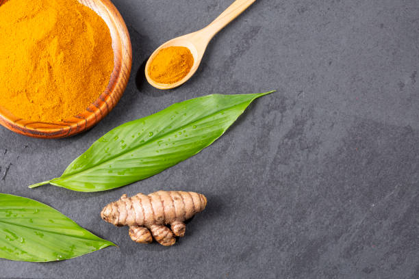 istock Fresh Organic Root And Turmeric Powder - Curcuma Longa 1369105395