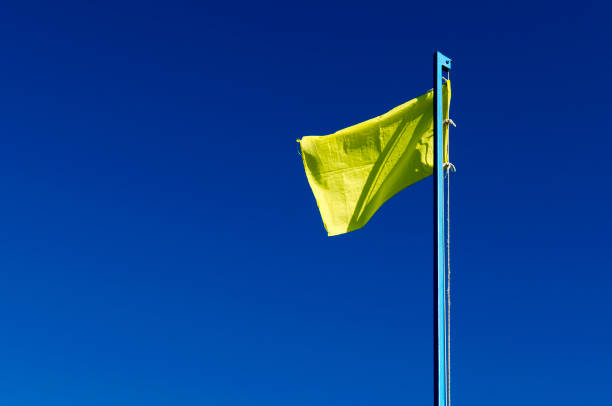 istock rescue yellow flag against the sky 1369106990