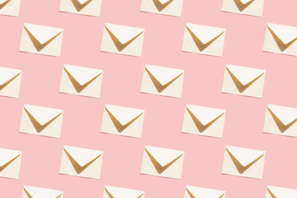 istock Blank letter envelope on pink background. Romantic message for the holiday seamless pattern 1369107349