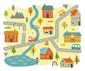 istock Naive city map for nursery carpet. Doodle baby town print with houses and cars. 1369108452