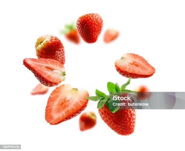 Strawberry Berry Levitating On A White Background Stock Photo - Download Image Now - Strawberry, Falling, White Background