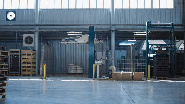 istock Large factory warehouse products at shipment complex distribution concept 1369119551